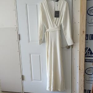 Peace + Love Vintage Wrap Jumpsuit With Highcut leg.